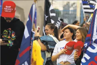  ?? Courtney Pedroza / Getty Images 2020 ?? Supporters of former President Donald Trump gather to protest the election results outside the Maricopa County Elections Department office on Nov. 6, 2020, in Phoenix.