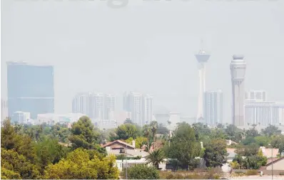  ?? STEVE MARCUS (2016) ?? Smoke from California wildfires in August 2016 obscures the view in the Las Vegas Valley. Several factors, including smoke from wildfires, drift from California’s smog and the desert heat, can prompt air quality advisories on a regular basis, according...