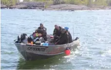  ??  ?? While we fished, Buckley used this boat to pick up campers from an island.