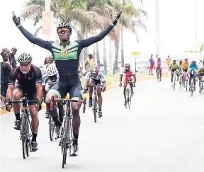  ?? CONTRIBUTE­D ?? Marloe Rodman celebratin­g his victory in the Jamaica Cycling Federation’s 2016 Kingston Criterium on Ocean Boulevard in downtown Kingston.