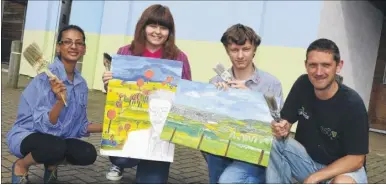  ?? Picture: Paul Amos FM4399343 ?? Students and Staff from John Wallis school prepare to paint at the Ashford Indoor Bowls Centre. From left teacher Manisha Thurmadoo, students Georgia Bundock and Adam Wilkinson, and teacher Michael Bean