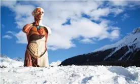  ?? Photograph: Felix Friedmann/Damien Hirst and Science Ltd, DACS 2021 ?? Up to his loins in crisp clean snow … Damien Hirst’s 21ft-tall Temple in St Moritz, Switzerlan­d.