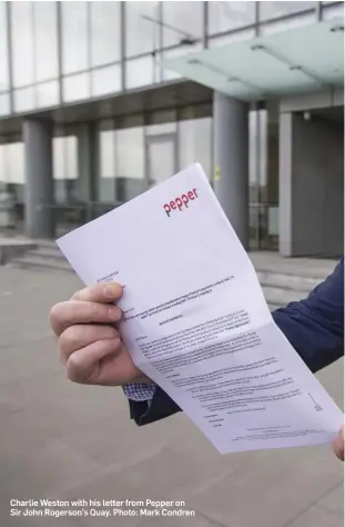  ??  ?? Charlie Weston with his letter from Pepper on Sir John Rogerson’s Quay. Photo: Mark Condren