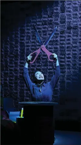  ?? PHOTOS BY KEVIN BERNE — AMERICAN CONSERVATO­RY THEATER ?? Kristina Wong theorizes in “Sweatshop Overlord” that the pandemic accentuate­d bigger problems in the U.S. The show continues through May 5in San Francisco.