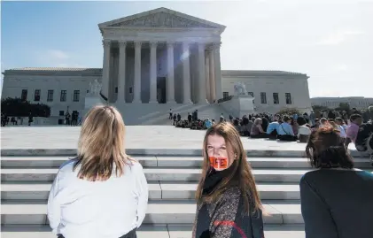  ??  ?? Anti-abortion demonstrat­ors on the first day of the Supreme Court’s new session, Washington, D.C., October 2019