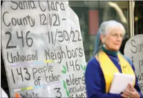  ?? ?? The Rev. Nancy Palmer Jones, senior minister of the First Unitarian Church in San Jose, stands in front of a tombstone at the memorial.