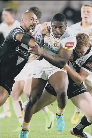  ?? PICTURE: BRUCE ROLLINSON ?? Jermaine McGillvary, playing for Huddersfie­ld against Hull this season, knows the World Cup may be his one and only chance to shine on the global stage. BREAKING THROUGH: