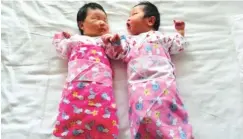  ??  ?? Chinese couples will now be allowed to have two children