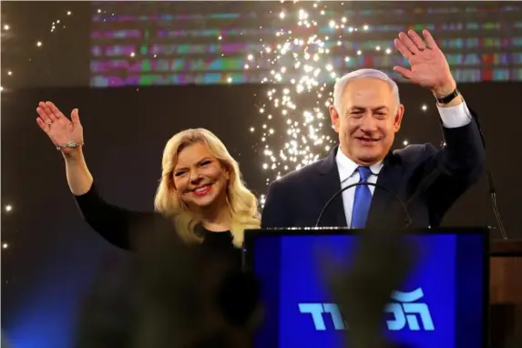  ??  ?? Israeli PM and wife Sara after April’s election results were announced (Reuters)