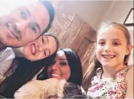  ??  ?? Announceme­nt: The couple posted this image online with Lampard’s daughters Luna and Isla, and their dog Minnie