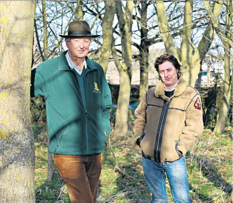  ??  ?? The secret’s out: Lord de Ramsey and his son, Fred Fellowes, on their estate, which hosted the Secret Garden Party festival, below, from 2003 to 2017