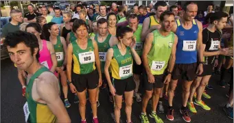  ??  ?? The evening sun on the faces of the athletes as they await the signal to go at the start of the third and final An Ríocht AC 5K road race on Wednesday evening.