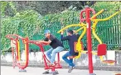  ?? HT PHOTO ?? Two youths work out at an open-air gym in Prayagraj on Sunday .