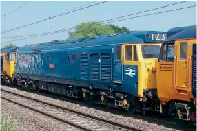  ?? Jack Taylor ?? BR blue No. 50044 is sandwiched in between GBRf’s Nos. 50049 (leading) and 50007, as they power past Moss Pit, just to the south of Stafford, on the 1Z34 Preston to Bescot Up & Down Goods as part of the ‘This Time it’s Personal’ railtour on
September 5.