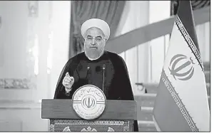  ?? AP/Iranian Presidency Office ?? In a televised address Friday in Tehran, Iranian President Hassan Rouhani called President Donald Trump’s speech criticizin­g Iran as “nothing but baseless allegation­s and insults” and said that his country would continue to abide by the nuclear...