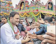  ?? PTI ?? Congress president Rahul Gandhi greets supporters at Huligemma Temple in Koppal, Karnataka, on Saturday.