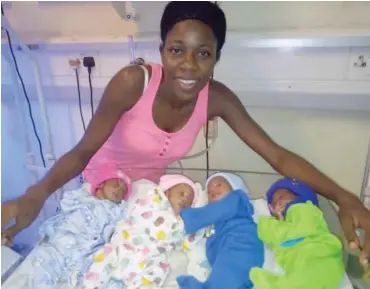  ?? Amodu quadruplet­s, with mother Temitope ??