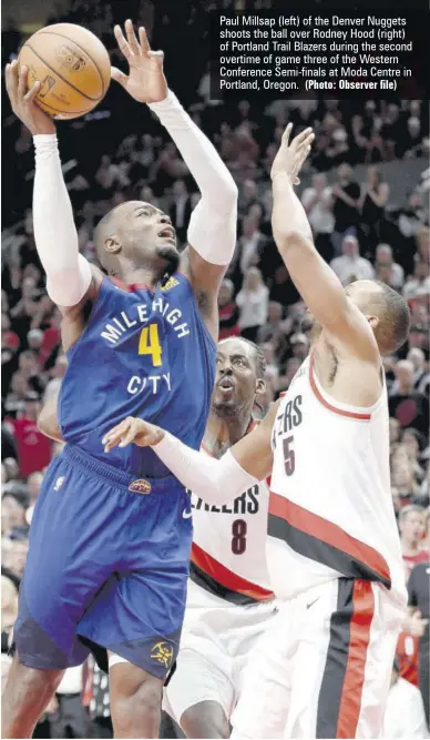  ?? (Photo: Observer file) ?? Paul Millsap (left) of the Denver Nuggets shoots the ball over Rodney Hood (right) of Portland Trail Blazers during the second overtime of game three of the Western Conference Semi-finals at Moda Centre in Portland, Oregon.