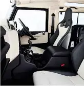  ??  ?? Leather-clad cabin of the Defender V8 with full infotainme­nt system is a far cry from what we are used to seeing