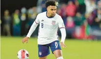 ?? JULIO CORTEZ/AP ?? Weston McKennie controls the ball during the first half of a FIFA World Cup qualifying match between Mexico and the United States on Nov. 12, 2021, in Cincinnati. The U.S. won 2-0.