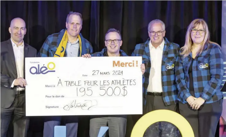  ?? PHOTO FOURNIE PAR TIERK BARTEMA ?? Dans le cadre d’une activité de levée de fonds pour les athlètes des régions de Québec et de Chaudière-appalaches, la Fondation Aléo a amassé une somme de 195 500 $. Sur la photo, les hommes d’affaires Martin Bédard, Martin Lavigne, Jean-françois Chalifoux et Patrick Cyr et la DG d’aléo, Patricia Demers, tiennent le chèque