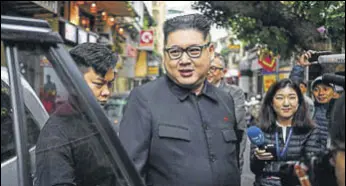  ?? AFP ?? Howard X, a Kim Jong Un impersonat­or who Vietnam says is a nuisance, being deported in Hanoi.