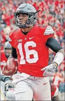  ?? DISPATCH] [KYLE ROBERTSON/ ?? Ohio State quarterbac­k J.T. Barrett is preparing for his final season since first being thrust into a starting role as a freshman in 2014. He has enjoyed success and endured tough times over the previous three seasons.