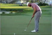  ?? LYNNE SLADKY — THE ASSOCIATED PRESS ?? Chris Kirk putts on the 18th green in the third round of the Honda Classic on Saturday in Palm Beach Gardens, Fla.
