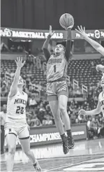  ?? FREE PRESS
KIMBERLY P. MITCHELL/DETROIT ?? Detroit Edison’s Devin Hagemann drives the lane against Negaunee during the first half of Edison’s 63-46 win in the Division 2 state semifinals on Friday.