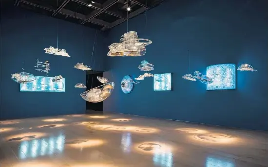  ?? Palm Springs Art Museum ?? GYULA KOSICE’S “Hydrospati­al City” installati­on entrances with suspended architectu­ral constructi­ons in clear acrylic, like hovering topsy-turvy space stations.