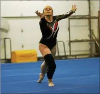  ?? COLEEN MOSKOWTIZ — THE NEWS-HERALD ?? Chardon’s Kayla Benjamin competes at the WRC gymnastics meet on Feb. 15.