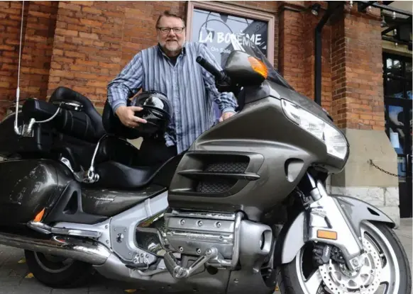  ?? COLIN MCCONNELL/TORONTO STAR ?? Ben Heppner, who opens with the Canadian Opera Company on Saturday in Peter Grimes, with his pride and joy outside the COC offices in Toronto.