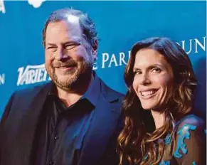  ?? AFP PIC ?? Marc (left) and Lynne Benioff say they won’t be involved in day-today operations or journalist­ic decisions at Time magazine and plan to keep its current leadership team in charge.