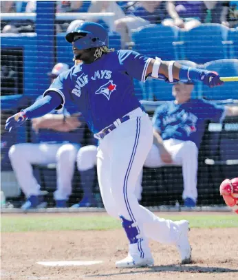  ?? LYNNE SLADKY / THE ASSOCIATED PRESS ?? If the Toronto Blue Jays don’t promote mega-prospect Vladimir Guerrero Jr. until mid-april or later, he wouldn’t be eligible for free agency until after the 2025 season.