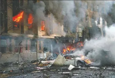  ?? (AP/Will Morris) ?? Flames and smoke pour from a building at the Pentagon in Washington on Sept. 11, 2001.