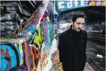  ?? DAVE SIDAWAY ?? Filmmaker Pascal Plante walks through an area of Montreal that was used in his first fictional feature film, Les faux tatouages.