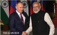  ?? Putin (L) with Modi ??