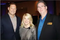  ?? NWA Democrat-Gazette/CARIN SCHOPPMEYE­R ?? Charles and Sue Redfield (from left) visit with Jack Eaton, Single Parent Scholarshi­p Fund of Benton County executive director, before the group’s Corporate Luncheon.