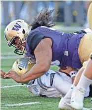  ?? PRESS ASSOCIATED ?? Washington's Vita Vea sacks UCLA quarterbac­k Josh Rosen during a game last season.