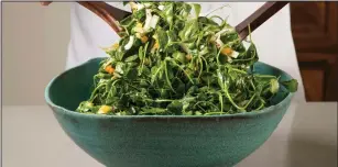  ?? Daniel J. van Ackere/America’s Test Kitchen via AP ?? Pea Green Salad with Warm Apricot-Pistachio Vinaigrett­e, from the cookbook “Vegetables Illustrate­d.”