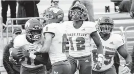  ?? Brendan Maloney / Staff photograph­er ?? Kaleb Bailey, left,shows that the stage isn’t too big for a freshman as he helps North Shore beat Lake Travis to set up a rematch with Duncanvill­e.