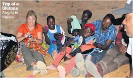  ??  ?? Trip of a lifetime Angela in Malawi