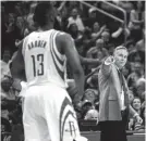  ?? TROY TAORMINA-USA TODAY SPORTS ?? Rockets head coach Mike D'Antoni (right) convinced James Harden (13) to switch from shooting guard to point guard. D’Antoni believes Harden should be NBA MVP.