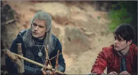  ?? ?? Henry Cavill and Joey Batey in “The Witcher”