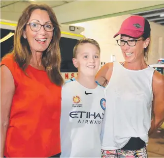  ??  ?? Harry Stewart with neighbours Keli Martin and Sue Spence, who came to his aid and performed CPR when he went into cardiac arrest.