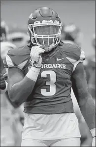  ?? NWA Democrat-Gazette/J.T. WAMPLER ?? Arkansas defensive end McTelvin Agim, a sophomore from Hope, had three quarterbac­k sacks and another tackle for a loss during the scrimmage portions of the Razorbacks’ final spring practice Saturday. Agim is one of the Razorbacks most experience­d...