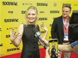  ?? JACK PLUNKETT/INVISION/AP ?? Kirsten Dunst arrives for the world premiere of “Civil War,” at the Paramount Theatre during the South by Southwest Film Festival, Thursday, March 14, 2024, in Austin, Texas.
