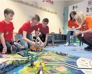  ??  ?? Building for future McLaren teams took part in the IET First Lego League final