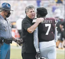  ?? GERALD HERBERT/AP ?? Coach Mike Leach was a big winner Saturday in his debut for Mississipp­i St.