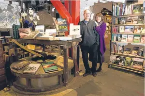  ??  ?? Top: Maddie Mackenzie, 7, buying mugs for the homeless in an innovative charity campaign at Homer in Edinburgh. Above, Kevin and Jayne Ramage. Homer wanted to lend full support to an “innovative and worthwhile project”, Jayne Ramage said.